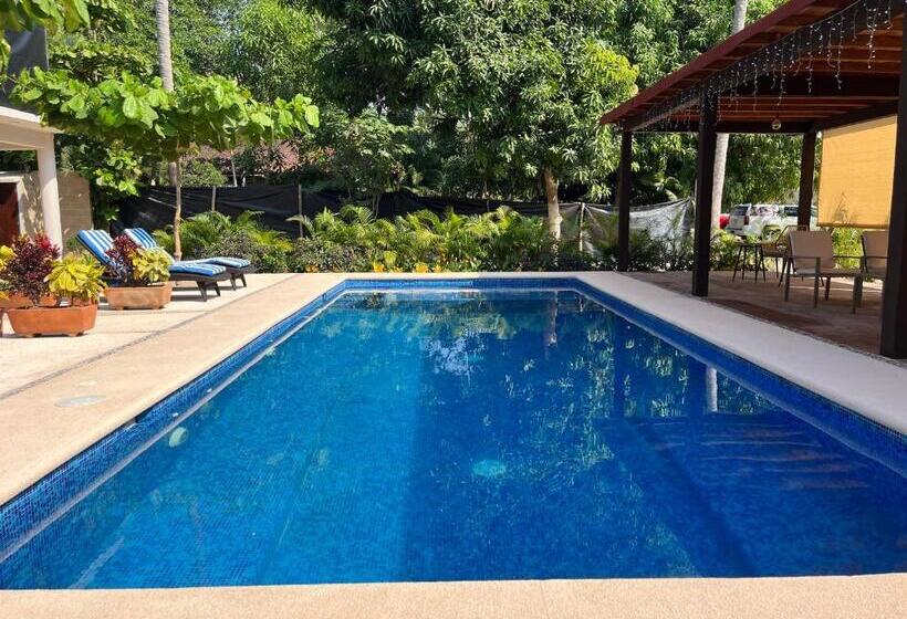 Natura Hotel & Villas