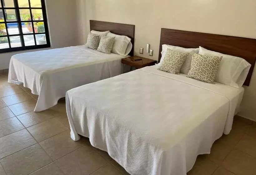 Natura Hotel & Villas