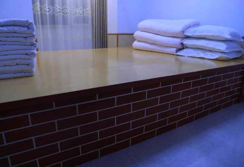 Yabuli Qingyun County Xin Ding Apartment