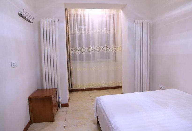 Yabuli Qingyun County Xin Ding Apartment