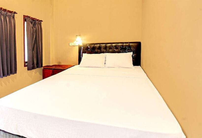 פנסיון Capital O 92747 Ombak Cafe & Homestay