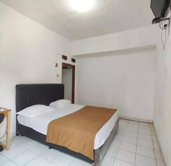 ホテル Penginapan Nurmega Jaya