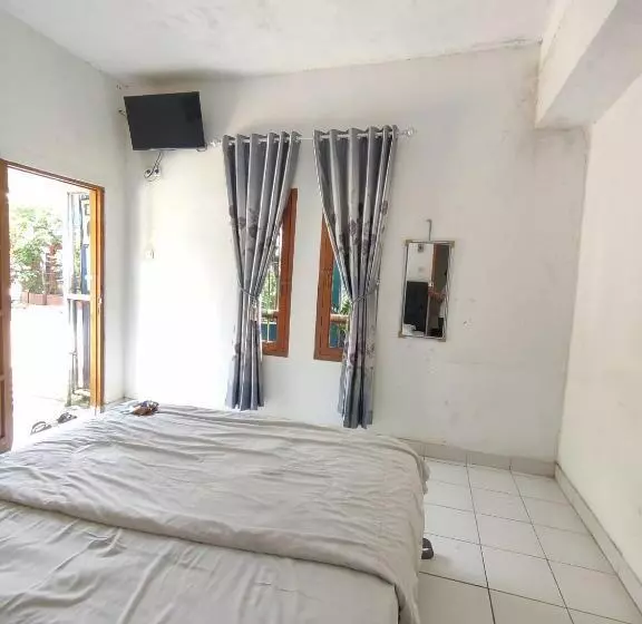 ホテル Penginapan Nurmega Jaya