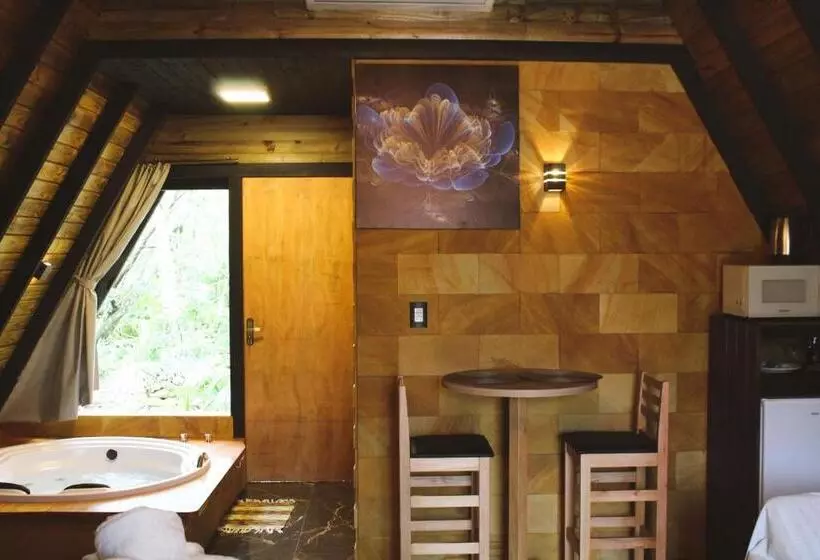 ペンション Chalé Suiço Com Hidromassagem E Café Da Manhã