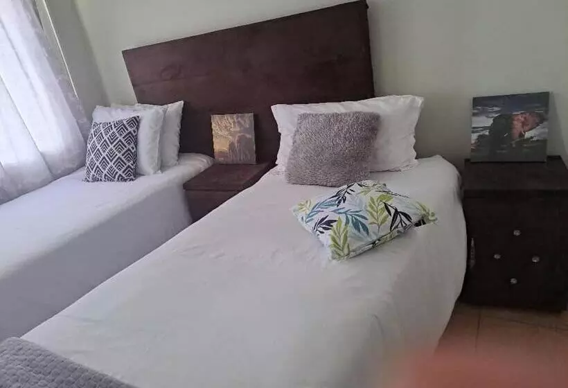 تختخواب و صبحانه Virgin Guesthouse