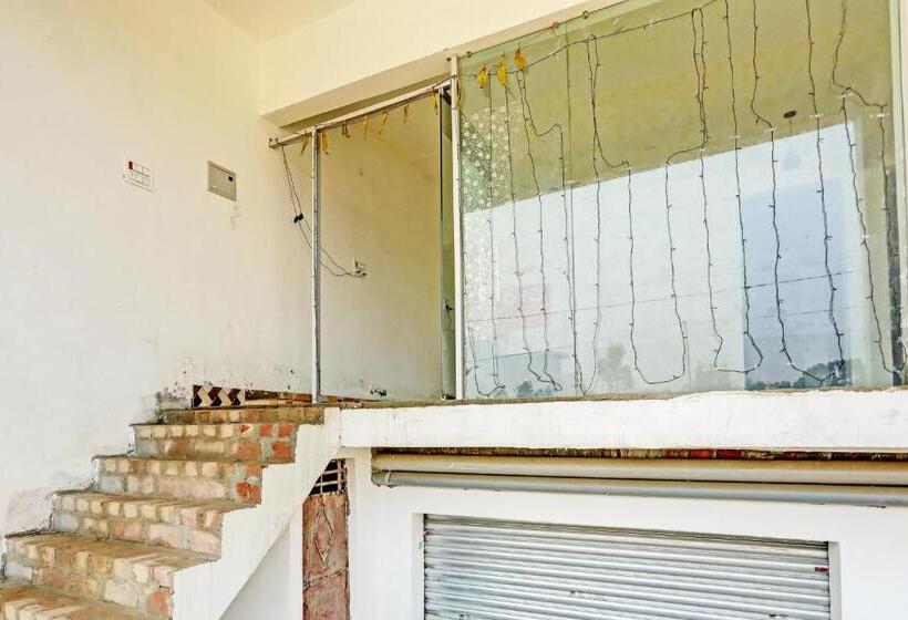 酒店 Oyo Alpha Guest House & Restaurant