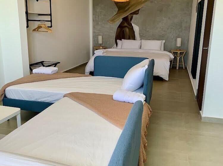 Отель Corcega Beachfront Suites