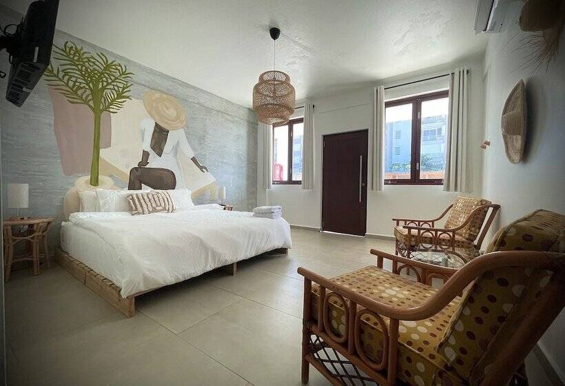 Отель Corcega Beachfront Suites