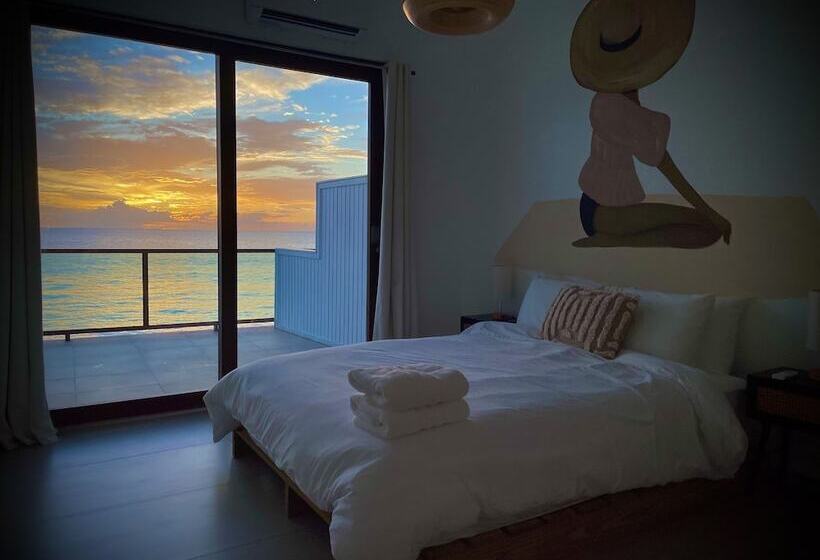 Отель Corcega Beachfront Suites