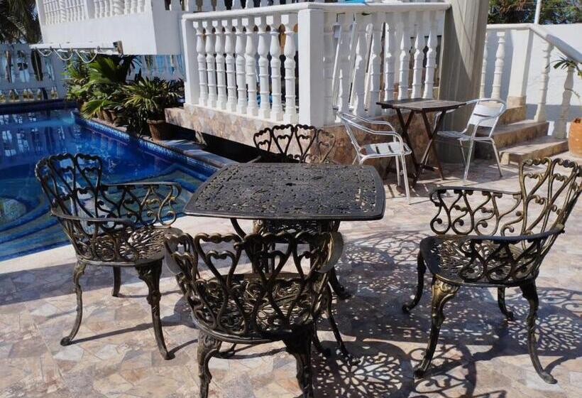 تختخواب و صبحانه Sunset Paradise