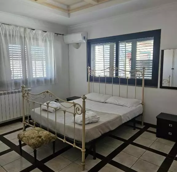 تختخواب و صبحانه Villa Courrier