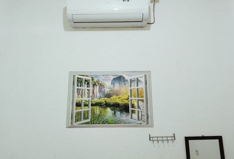 בית מלון כפרי Eleven Guest House Syariah