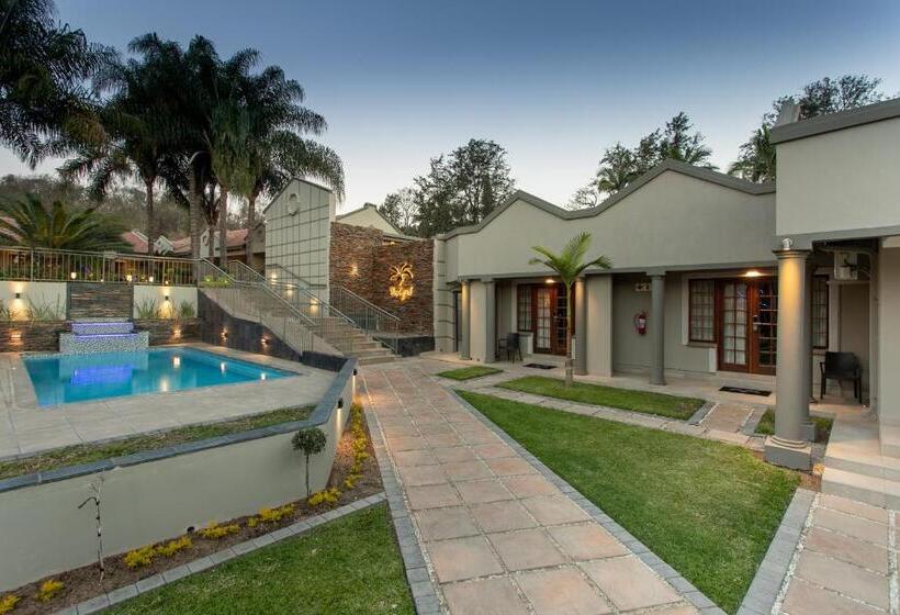 호텔 The Cycad Lodge & Chalets