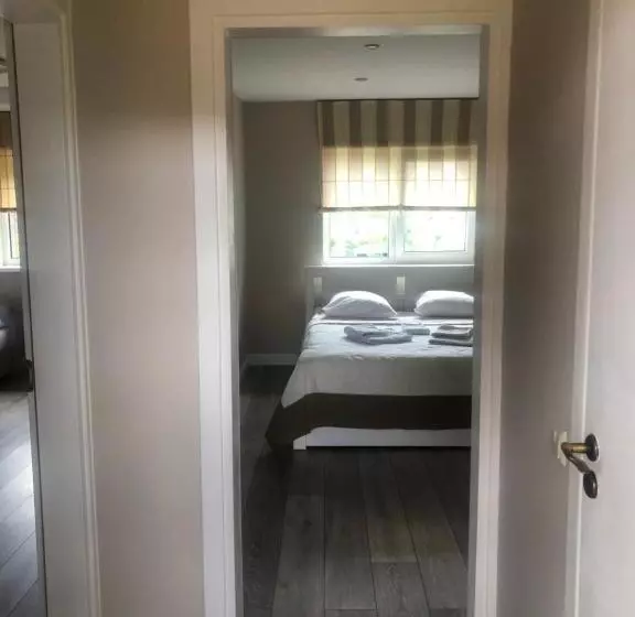 تختخواب و صبحانه Ošupio Tako Apartamentai