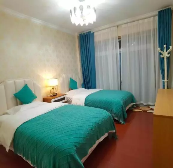 ユースホステル Mama Naxi Guesthouse
