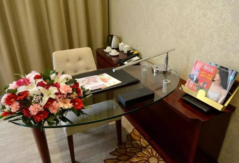 هتل New Century  Yiwu Rixin