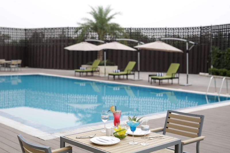 호텔 Golden Tulip Suites Gurgaon