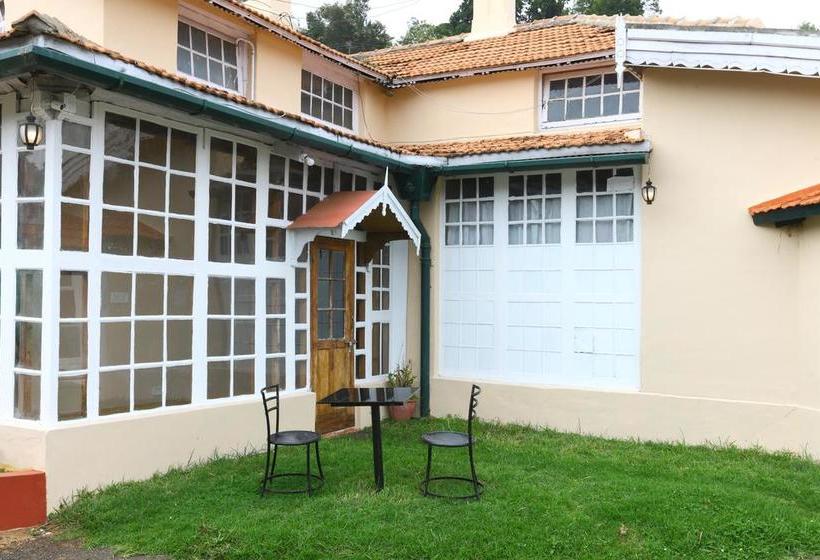 Hotell Oyo 9080 Hillwood Cottages