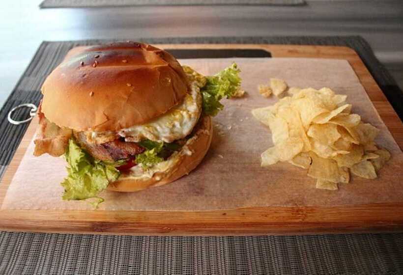 The Cavern Pod Hotel & Specialty Café Hostel