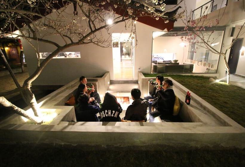 Отель Lijiang Shuhe Travelling With