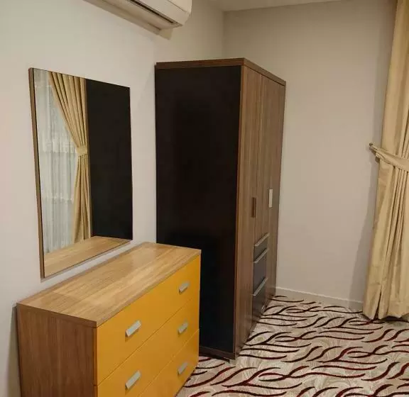 اجنحة النرجس الفندقية