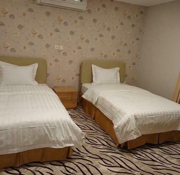 اجنحة النرجس الفندقية