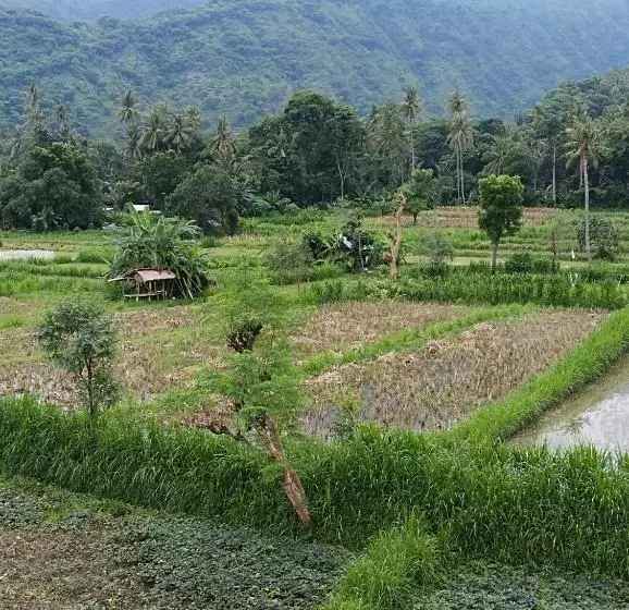 ペンション Amed Stop Inn Homestay, Rooftop Restaurant And Bar