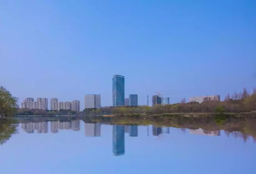 هتل Auto City Ruili