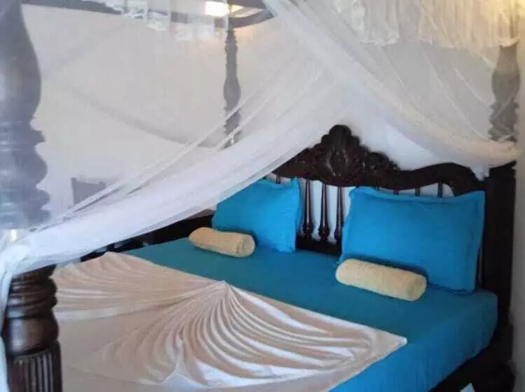 ペンション Pearl Cave Cabanas & Resturant