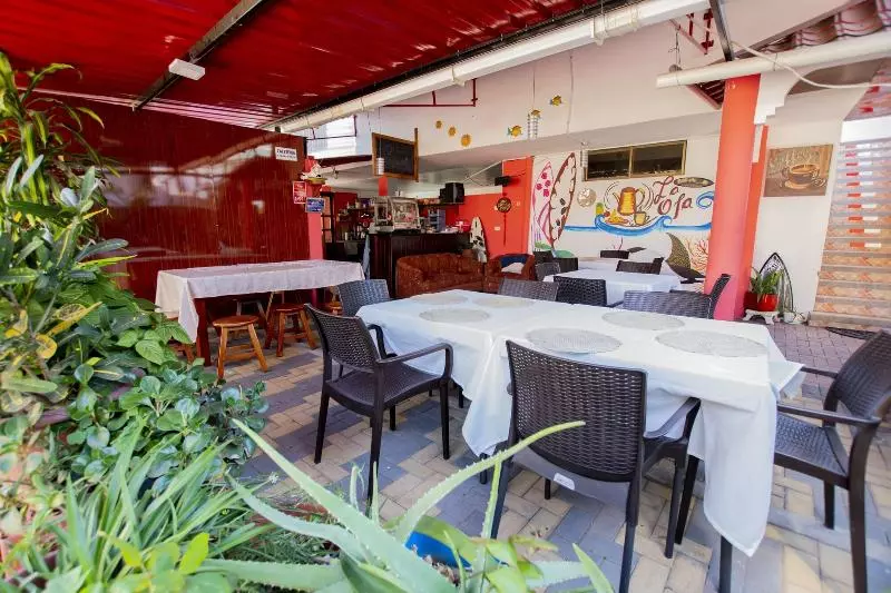 ペンション Hostal Tongo Reef