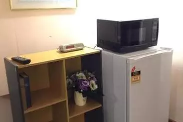 בית מלון כפרי Mid City Motor Lodge