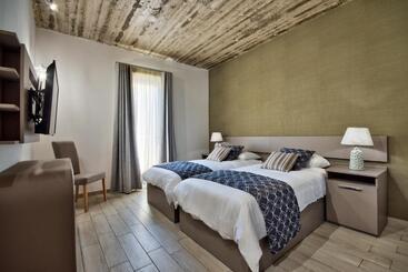 ホテル Cozy Rooms