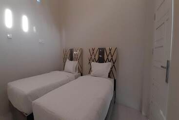 ホテル Oyo 3414 Gurita Residence Syariah