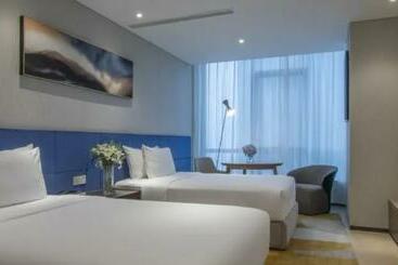 Отель Hangzhou Bedom Apartment Star Avenue