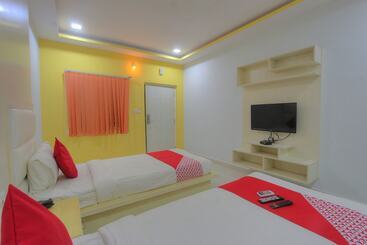 Capital O 15965 Hotel Nandi Gateway