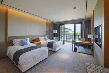 Hotelli Howard Johnson By Wyndham Glory Plaza Qidong