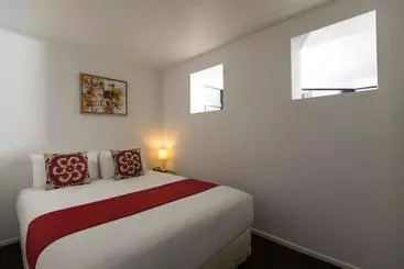 Отель Quest On The Terrace Serviced Apartments