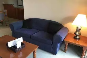 Отель The Belmore Apartments