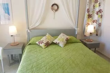 Natura Beach Hotel And Villas