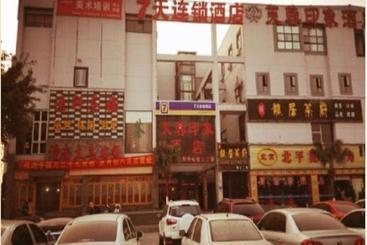 בית מלון כפרי 7days Inn Chengdu Airport Sichuan University