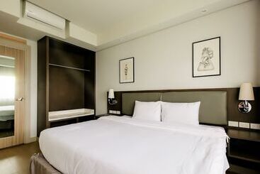 Отель Capital O 804 The Residences At Bonifacio Civic Center