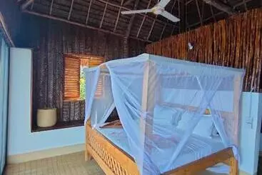 Appartement-hotel Mtende Beach Bungalow Océan View