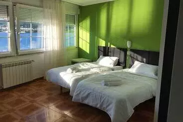 Hotel Playa De Quenxe