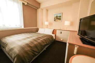 בית מלון כפרי Route Inn Grantia Fukuyama Spa Resort