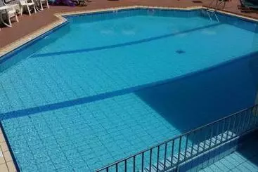 酒店 Theos Village Apartments