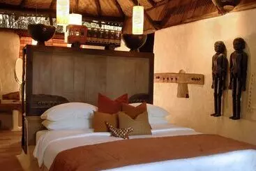 Отель Mahua Kothi Bandhavgarh - A Taj Safari Lodge