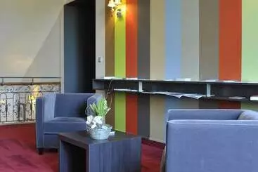 هتل Château De Champlong Table Hôtel Golf & Spa