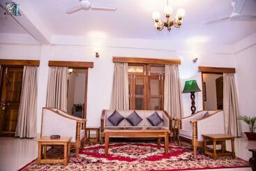 Отель The Camellia