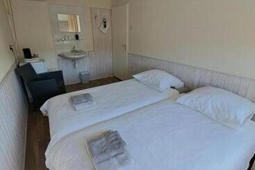 تختخواب و صبحانه Agterdekoog