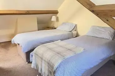 Mökkimajoitus The Coach House